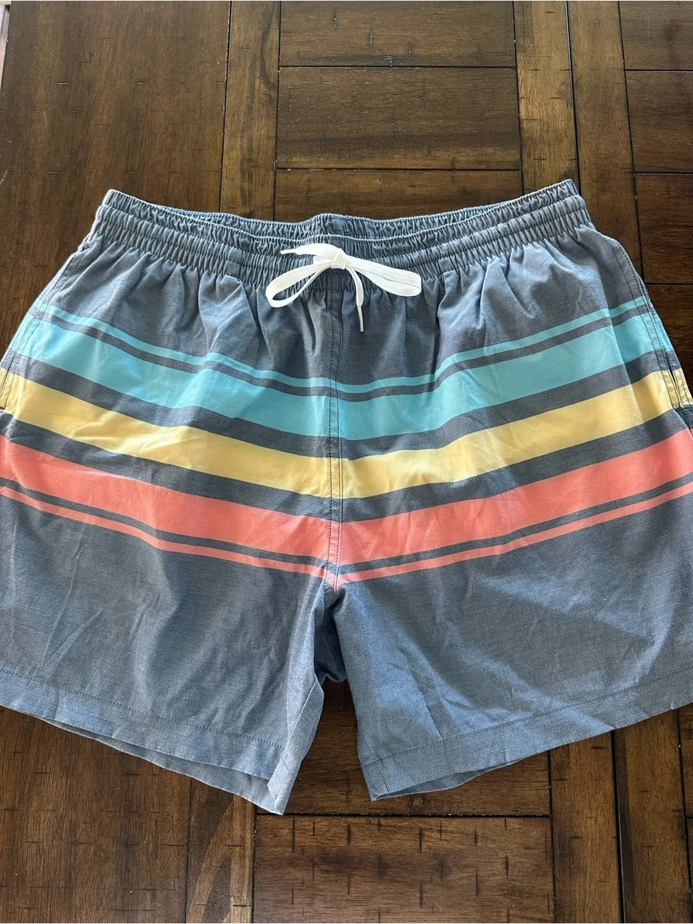 chubbies Blue Swim Trunks with Aqua Yellow and Coral Stripes 5.5”